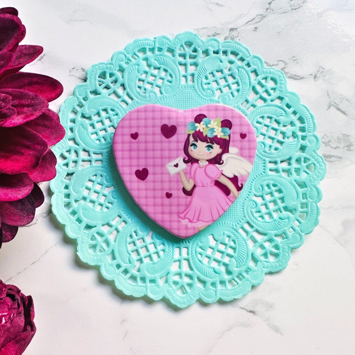 Cupid heart badge