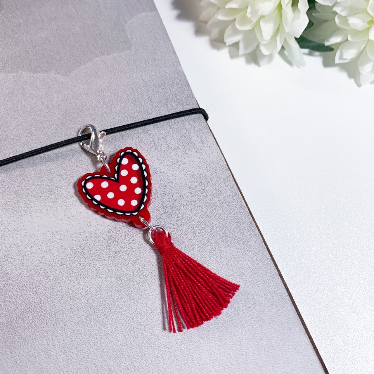 Red heart charm with tassel