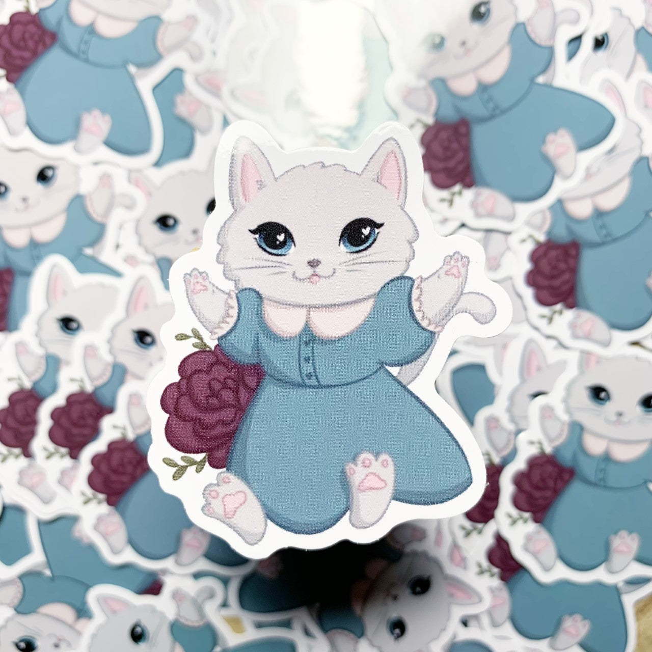 Kitten in a dress vinyl sticker
