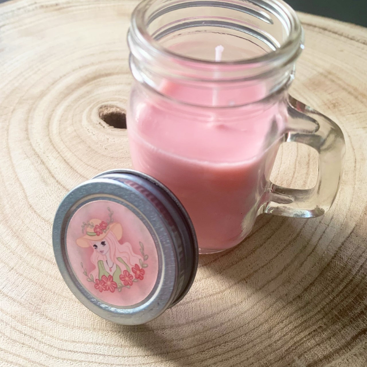 Small pink candle in a jar - Floral hat girl